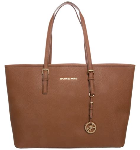 spot a fake michael kors jet tote bag|michael kors designer tote jetset.